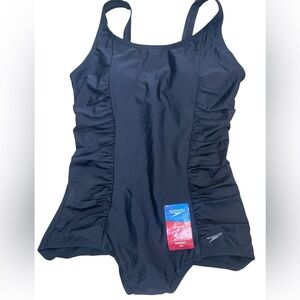 Speedo women’s black one piece tank swimsuit moderate leg NWT roushing on sides